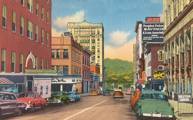 Vintage watercolor illustration of a bustling downtown street.