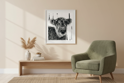 Little Roy baby calf painting hanging on a living room wall